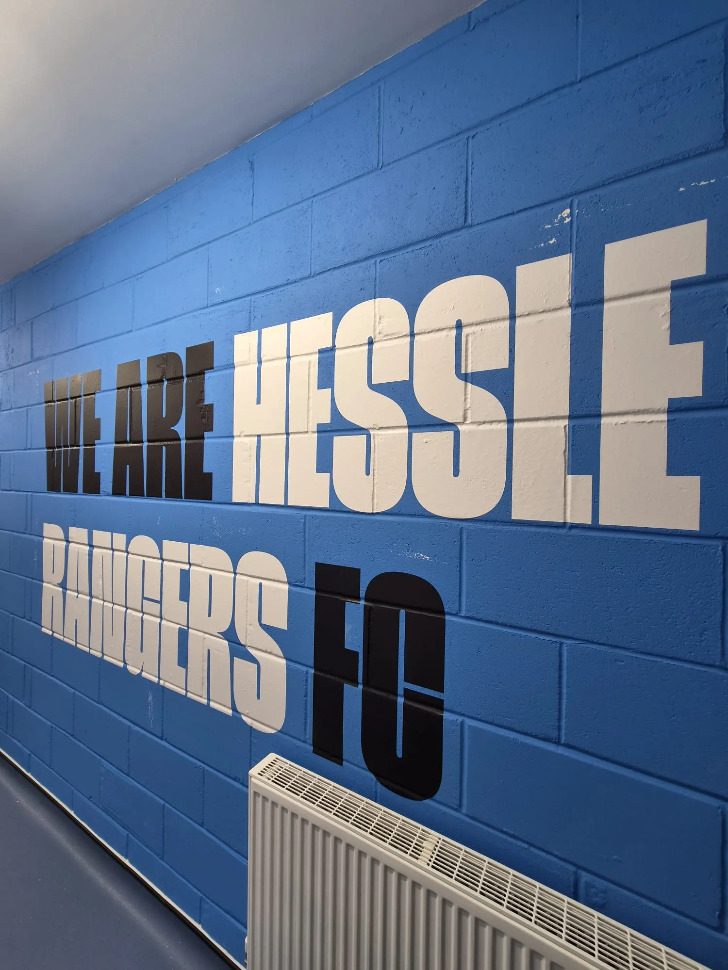 The 'We Are Hessle Rangers FC' mural inside the clubhouse